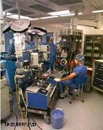 photo of perfusionist working at heart/lung machine